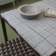 Tavolo pranzo ferro e cemento - decoro geometrico